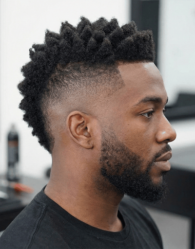 Faux hawk with mid fade